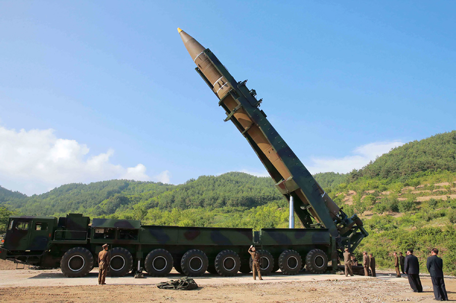 This photograph, released on July 4 by North Korea’s official Korean Central News Agency, shows North Korean leader Kim Jong Un (second on R) inspecting a Hwasong-14 intercontinental ballistic missile. (Photo credit: STR/AFP/Getty Images) This photograph, released on July 4 by North Korea’s official Korean Central News Agency, shows North Korean leader Kim Jong Un (second on R) inspecting a Hwasong-14 intercontinental ballistic missile. (Photo credit: STR/AFP/Getty Images)