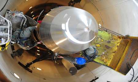 This 2013 photo shows members of the 91st Missile Wing’s missile maintenance teams at Minot Air Force Base, N.D. performing maintenance tasks at a launch facility for a Minuteman III intercontinental ballistic missile (ICBM).  Photo credit: Airman 1st Class Kristoffer Kaubisch/DVIDS