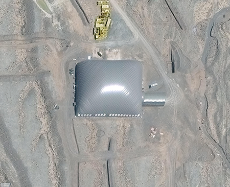 Satellite imagery of one of hundreds of missile silos being constructed in 2021 under inflatable domes at three missile fields and a training area in north central China. China is greatly expanding its nuclear arsenal. (Satellite image by Maxar Technologies/Analysis by Federation of American Scientists via Getty Images)