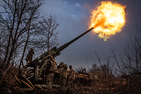 Ukrainian soldiers work on a Soviet-era Pion self propelled howitzer in the area of Chasiv Yar, Ukraine, in January 2025. The Russian war against Ukraine, now in its third year, has involved conventional weapons. (Photo by Wolfgang Schwan/Anadolu via Getty Images)