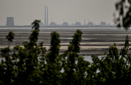 The Russian operator of the Zaporizhzhia Nuclear Power Plant, seen from Nikopol in 2023, is now under U.S. sanctions. (Photo by Ercin Erturk/Anadolu Agency via Getty Images)