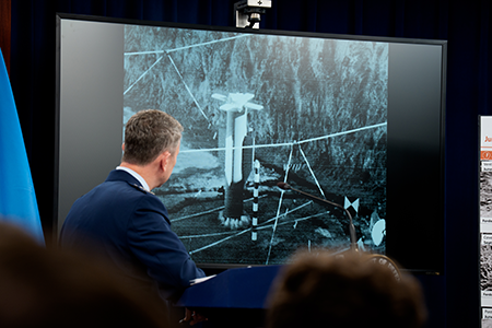 U.S. Chairman of the Joint Chiefs of Staff Air Force Gen. Dan Caine participates in  a press conference June 26 after the United States bombed three Iranian nuclear facilities.  The screen shows a video of a bombing test of the GBU-57A/B Massive Ordnance Penetrator, which was used in the attack on the Iranian Fordow uranium enrichment plant. (Photo by Andrew Harnik/Getty Images)